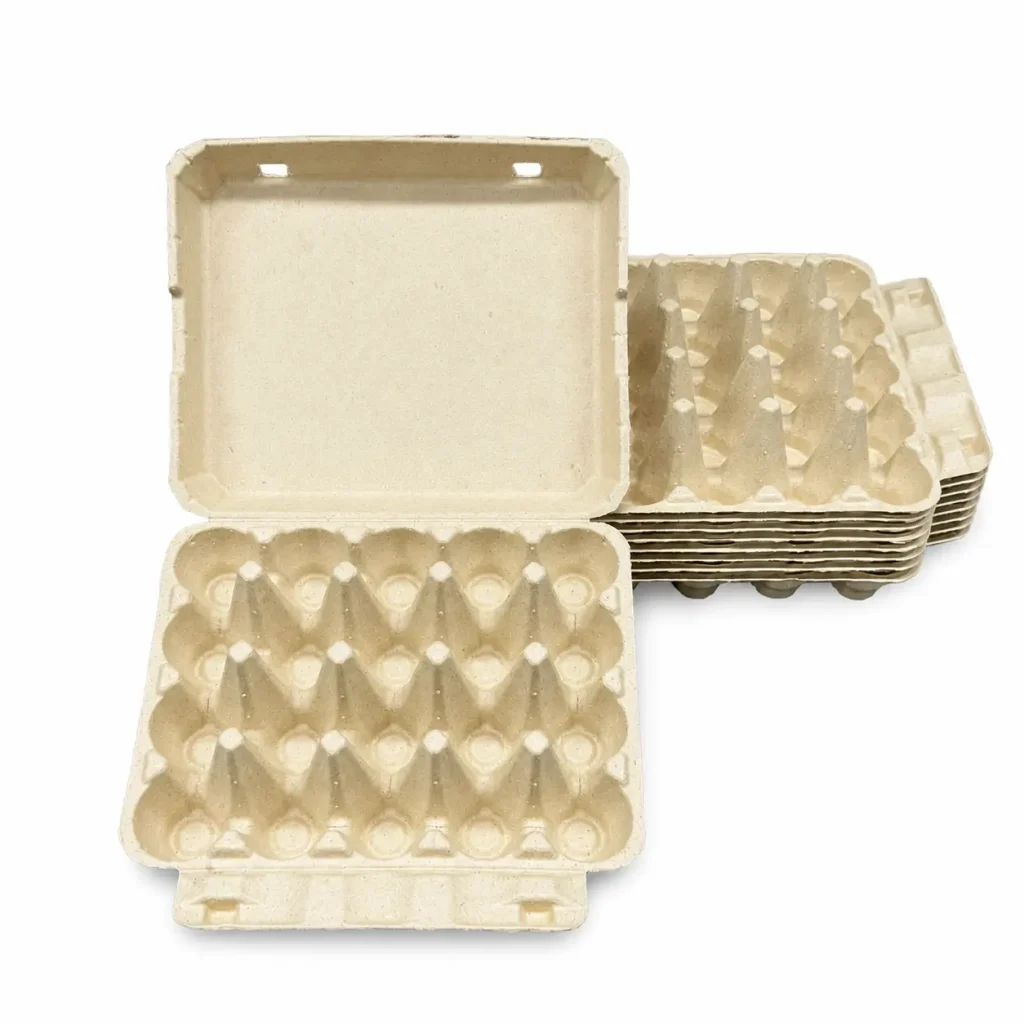 Open 20-count molded pulp egg carton with stacked cartons behind