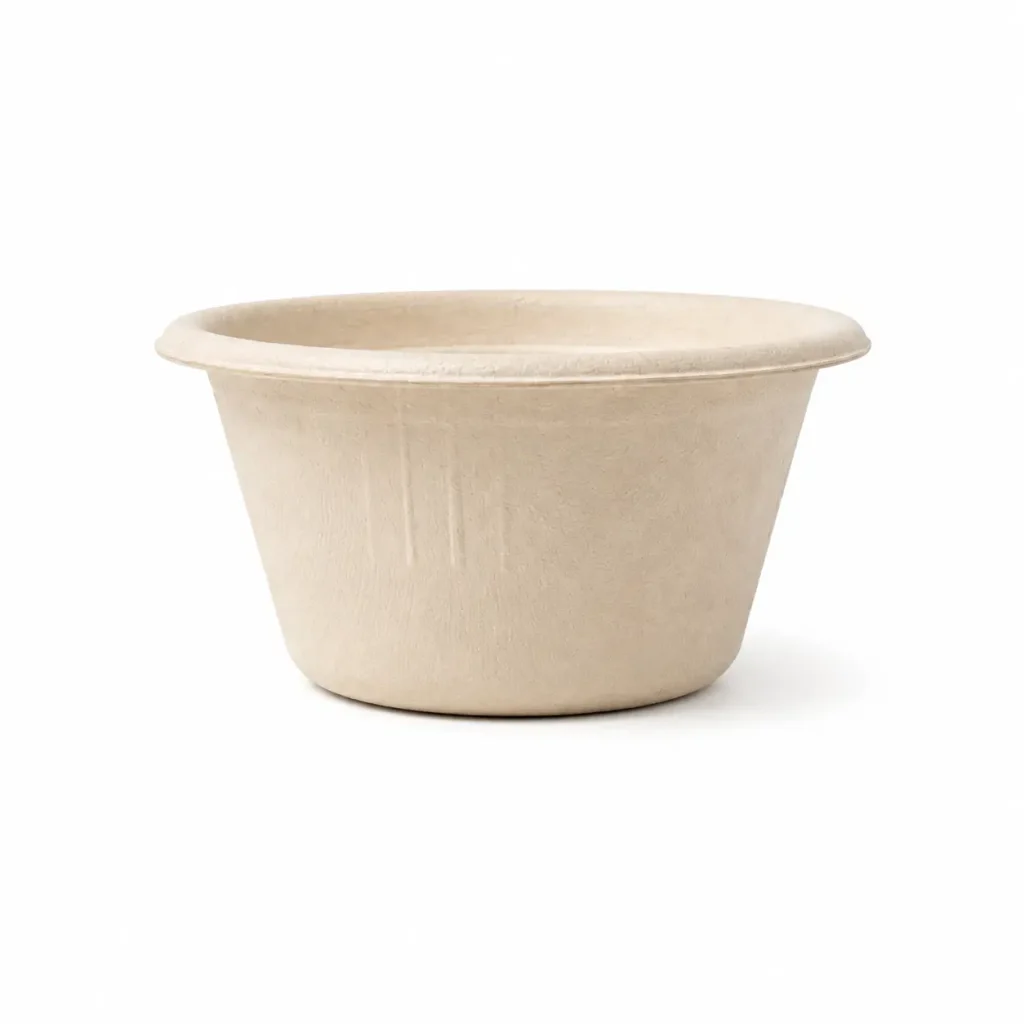 Angled front view of a natural-color 2oz Molded Fiber Sauce Cup showing its round opening, flanged rim, tapered sidewall, circular base, and molded-fiber texture