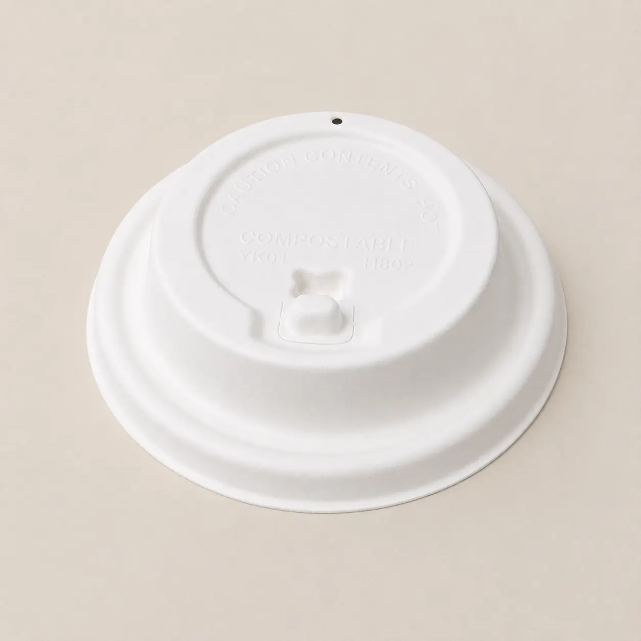 80mm Flip-Top Molded Fiber Hot Cup Lid – Closed White 80mm flip-top molded fiber hot cup lid with the hinged drinking tab in the closed position