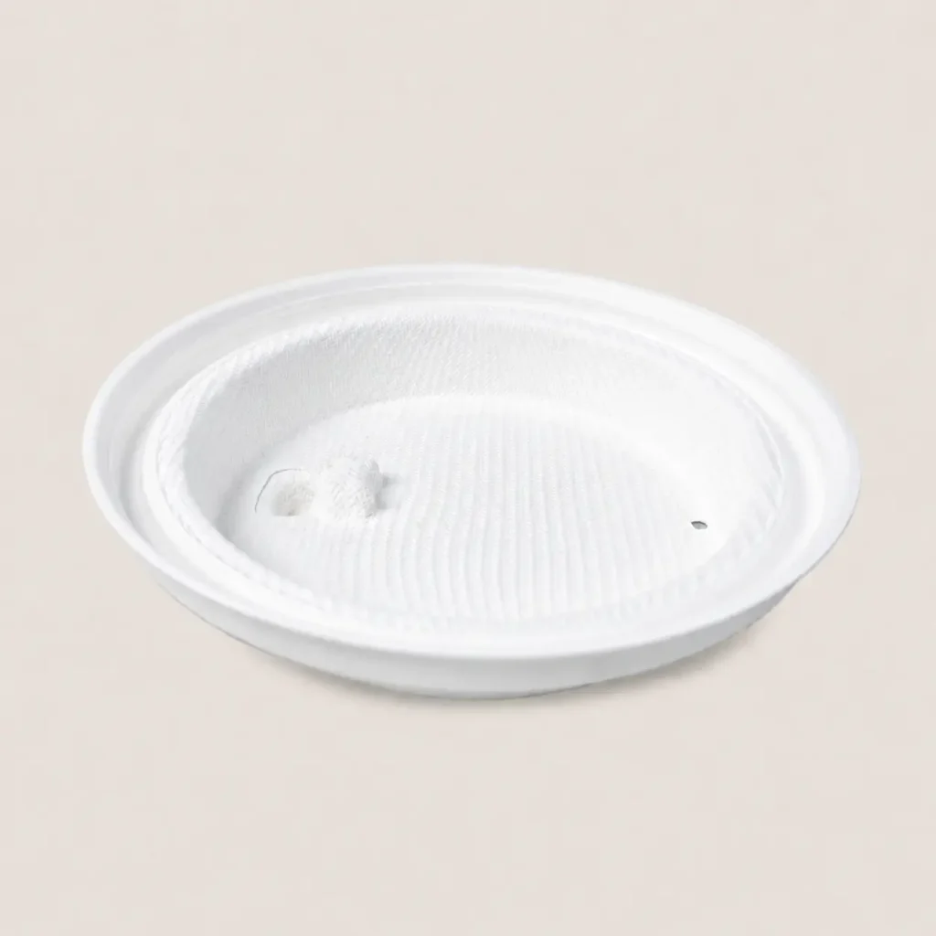 Underside view of a white 90mm flip-top molded fiber hot cup lid showing its inner texture and molded cup-rim channel
