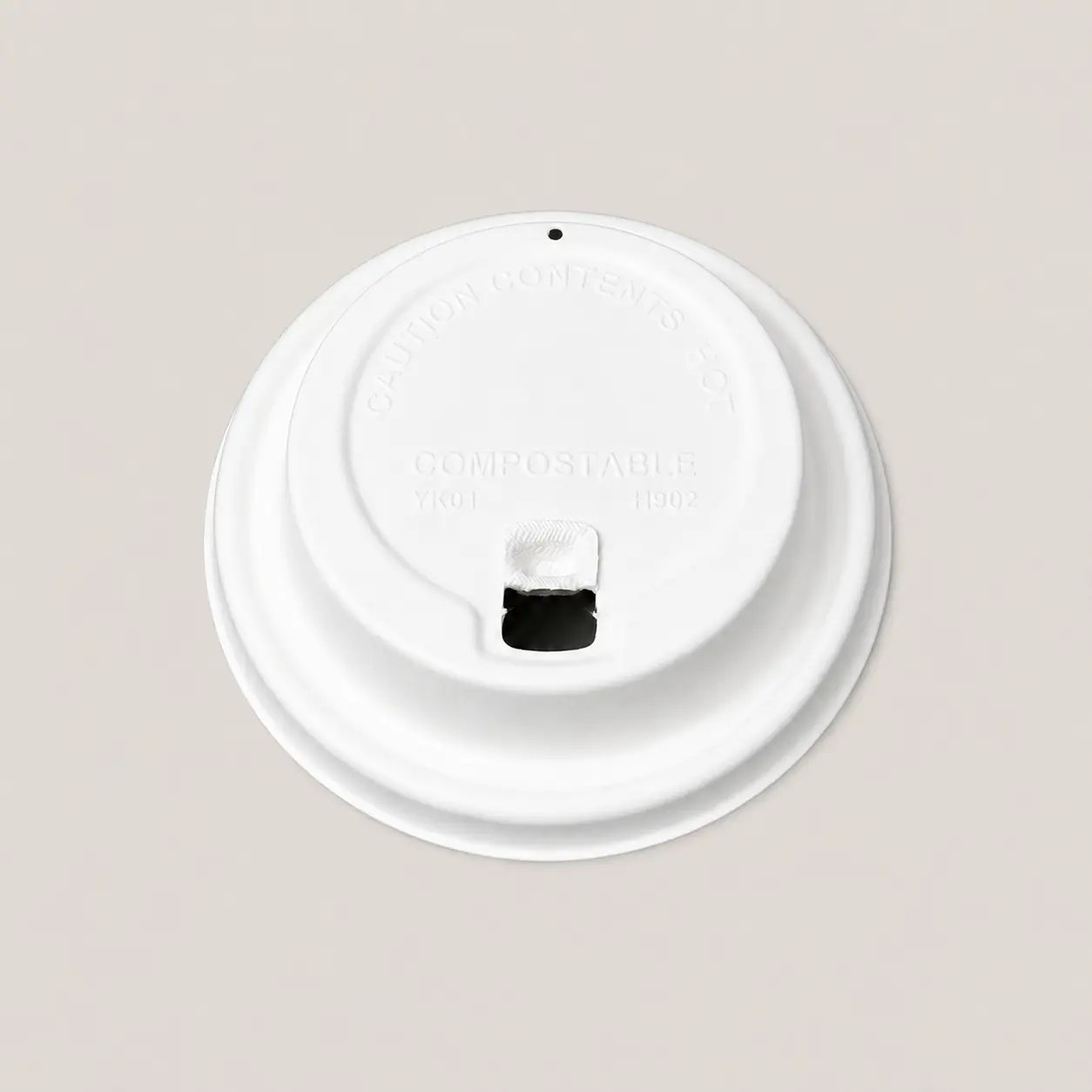 90mm Flip-Top Molded Fiber Hot Cup Lid with Open Drinking Tab Top view of a white 90mm flip-top molded fiber hot cup lid with the hinged tab lifted to expose the drinking opening