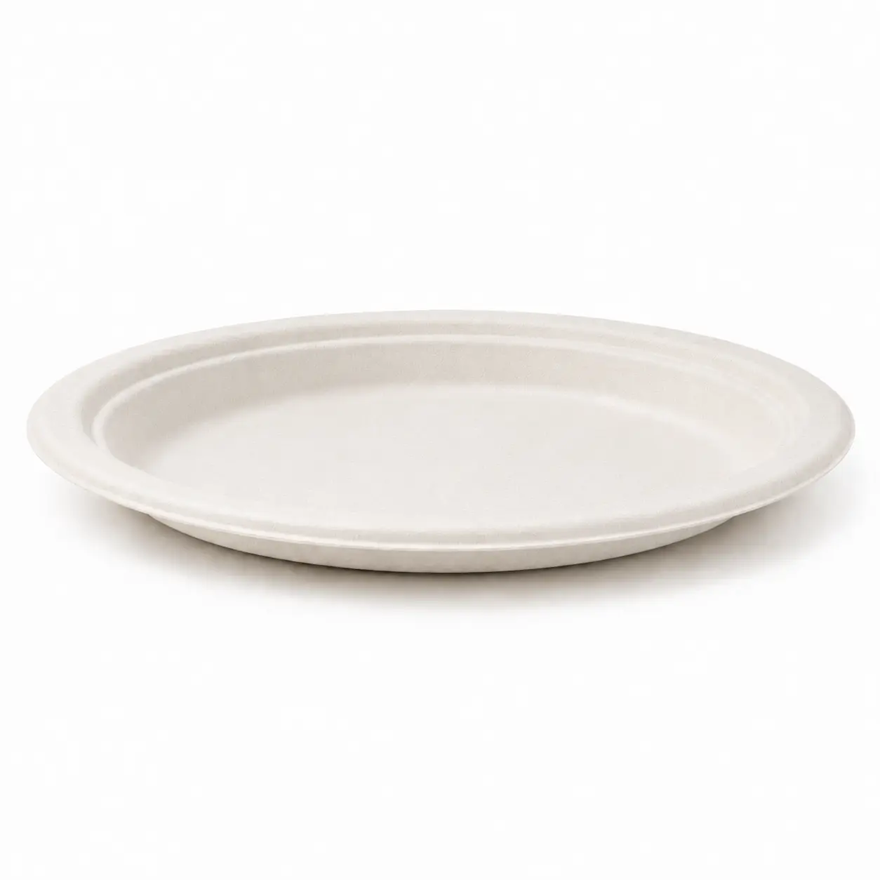 6-Inch Sugarcane Bagasse Round Plate Side Profile Low side view of a natural-color 6-Inch Sugarcane Bagasse Round Plate showing its shallow depth, raised rim and molded fiber edge