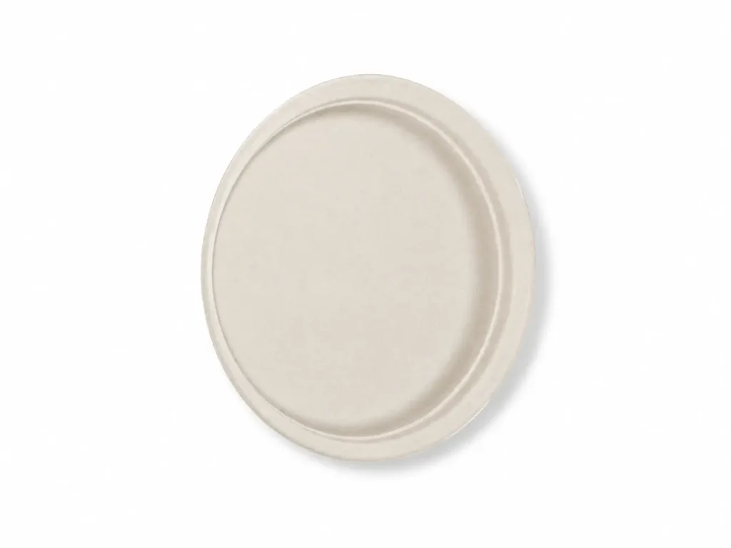 Angled view of a natural-color 10-Inch Sugarcane Bagasse Round Plate showing its broad serving area, raised rim, and shallow molded depth