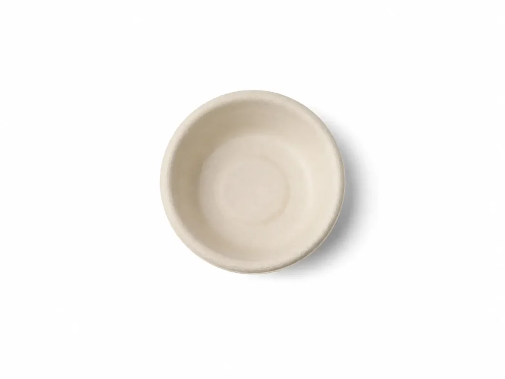 Top view of a natural-color 1oz Molded Fiber Sauce Cup showing its round inner serving area, continuous rim, and smooth molded-fiber interior