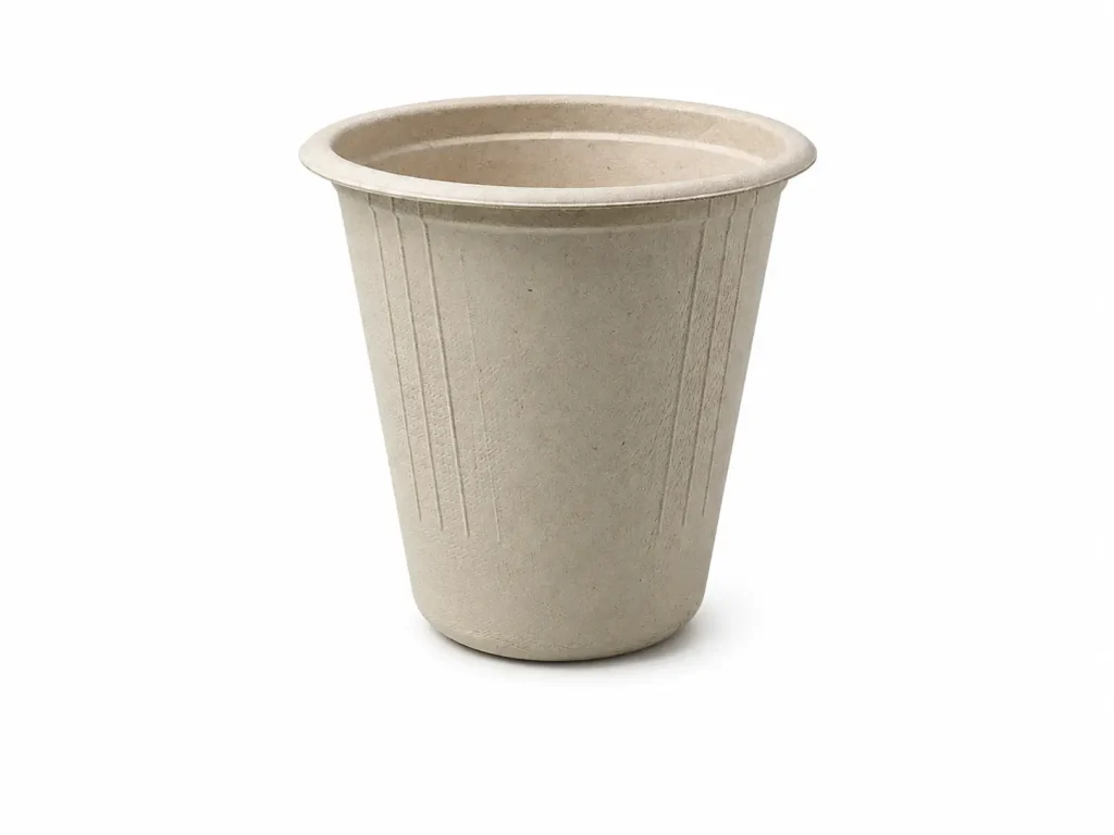Side view of a natural-color 6.5oz Molded Fiber Cup showing its flanged rim, tapered body, vertical reinforcing details, and circular base