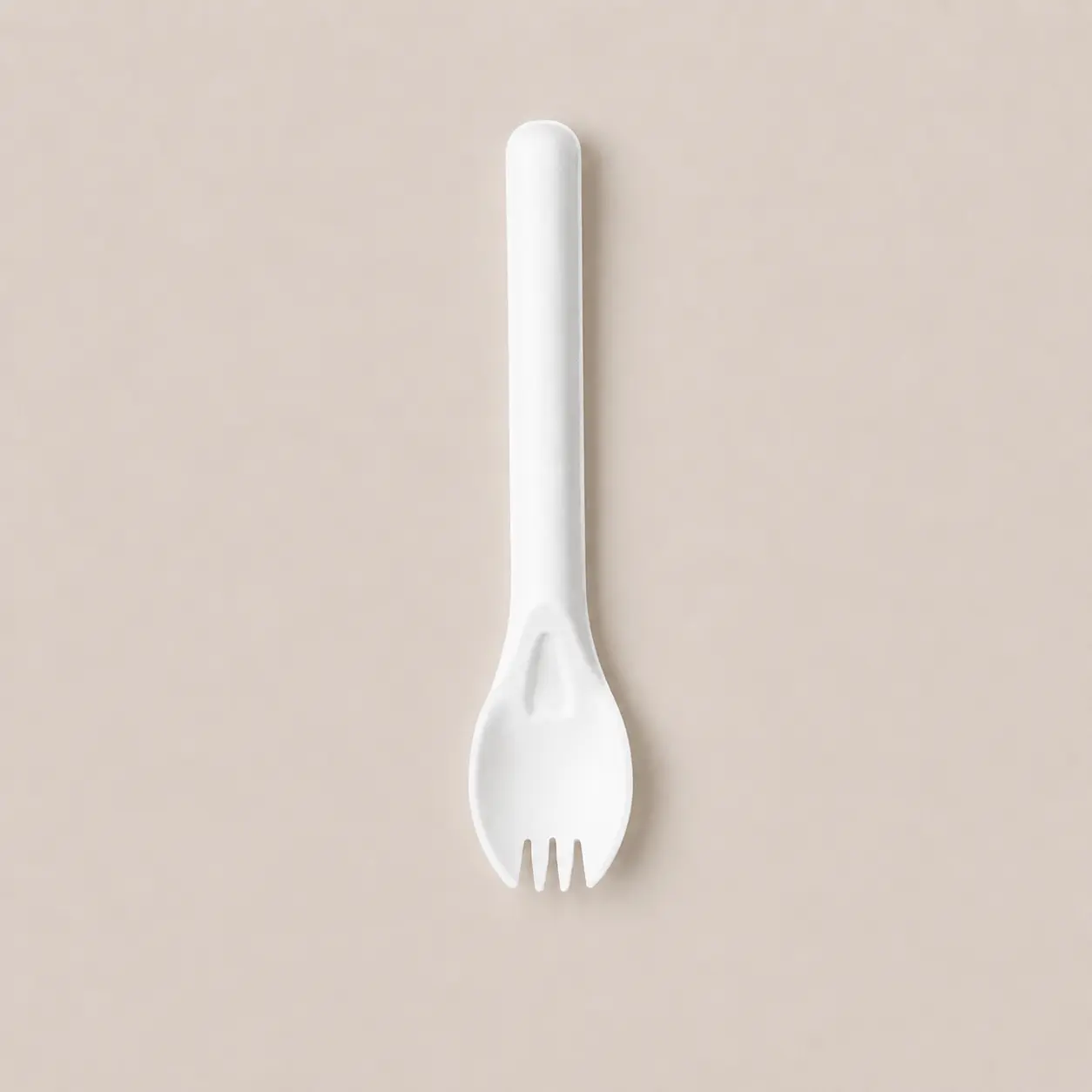 6-Inch Wide-Bowl Molded Fiber Spork Full Top View Full top view of a white 6-Inch Wide-Bowl Molded Fiber Spork showing its wide bowl, four short fork tines, molded neck reinforcement, and rounded handle end